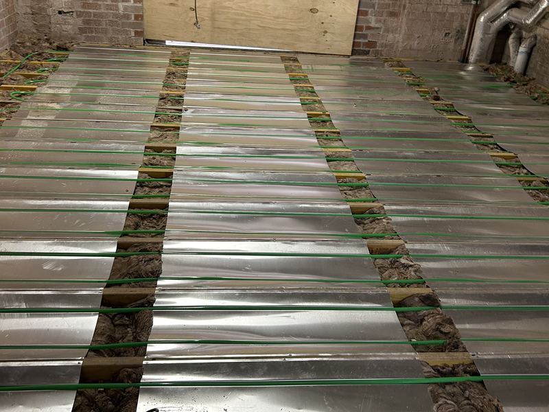 Under-timber hydronic heating installation photo 2